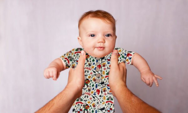 Boys bamboo romper with Viking print featuring ships, shields, helmets and Nordic designs